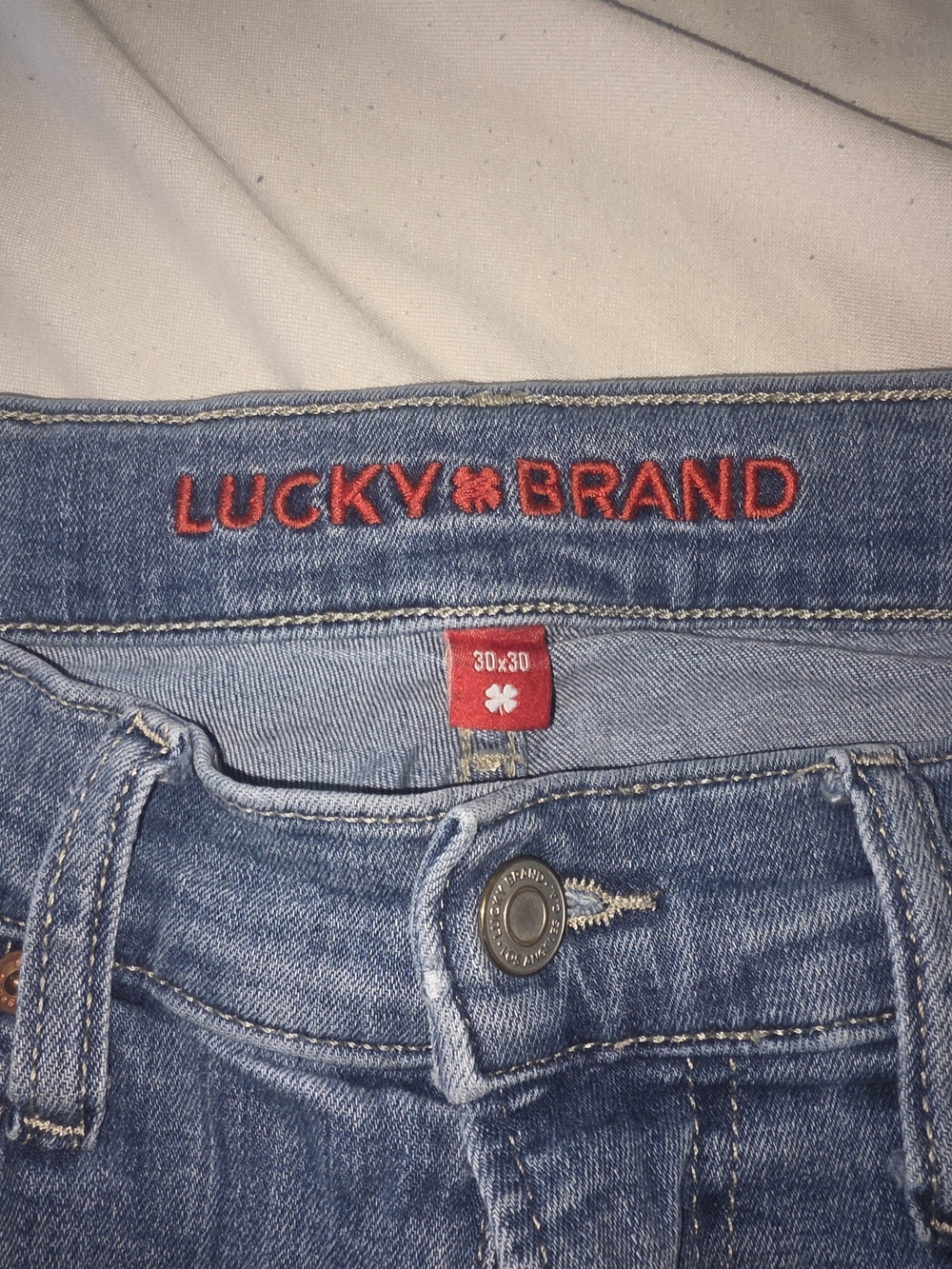 Lucky Brand Women's Light Blue Straight Leg Jeans with Red Logo Detail